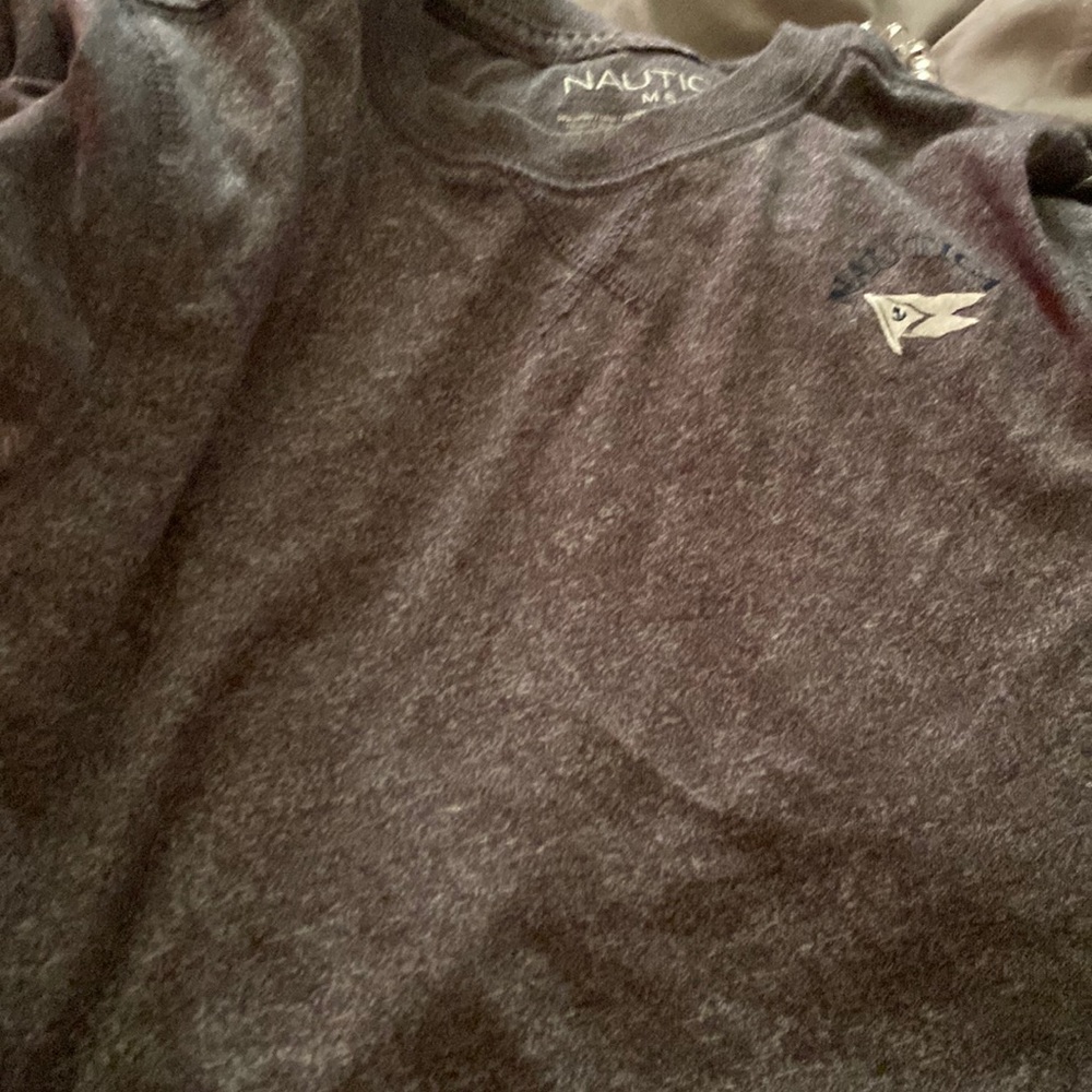 A  long sleeve gray nautica shirt a size 5